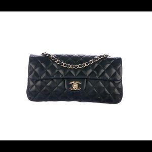 Chanel east west flap bag in black lamb skin leather with gold hardware